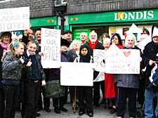 Frank Dobson MP, centre, joins campaigners who are fighting to keep Crowndale Road post office open