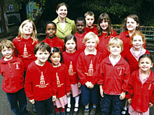 Christ Church Primary School headteacher Katy Forsdyke with some of her pupils who have earned praise