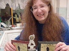Dr Helen Vecht with some of her cycling trophies
