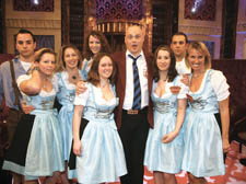 Al Murray with Bavarian Beerhouse waitresses.
