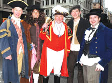 Pictured on the New Year's Day Parade, from left, with town crier Peter Moore, are Cllr Brian Connell as Mr Bumble, Cllr Robert Davis as Fagin, Cllr Steve Summers as Oliver and Cllr Daniel Astaire as the Artful Dodger