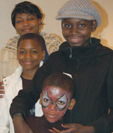 Stacey with mum Alezia Mpelekwa and brothers Bradley 11, and Dennia 7.